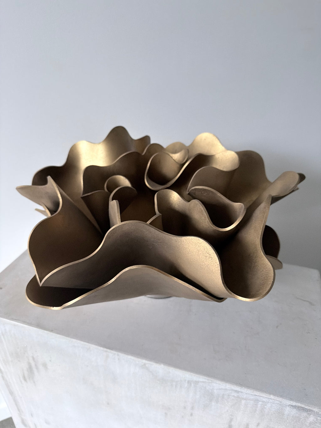 Aged Brass Peony Lamp, a sculptural lamp by Bec Stevens, seen from above, showing the layered petals